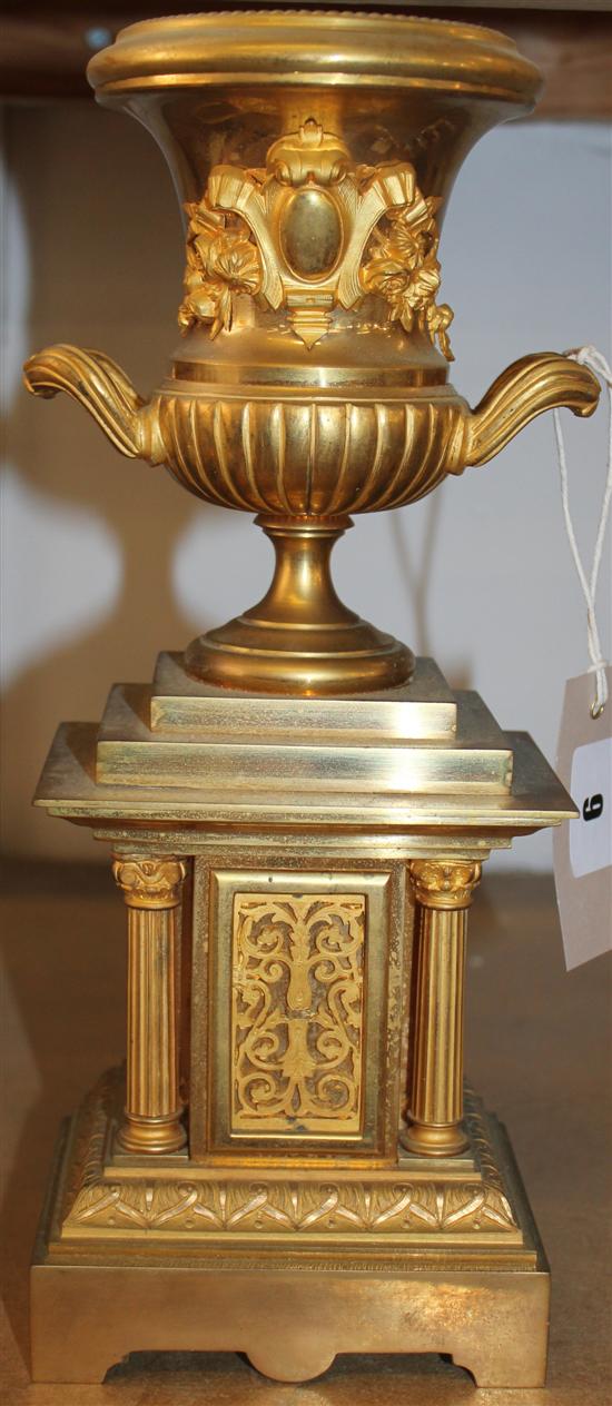 Gilt brass trophy vase and pedestal